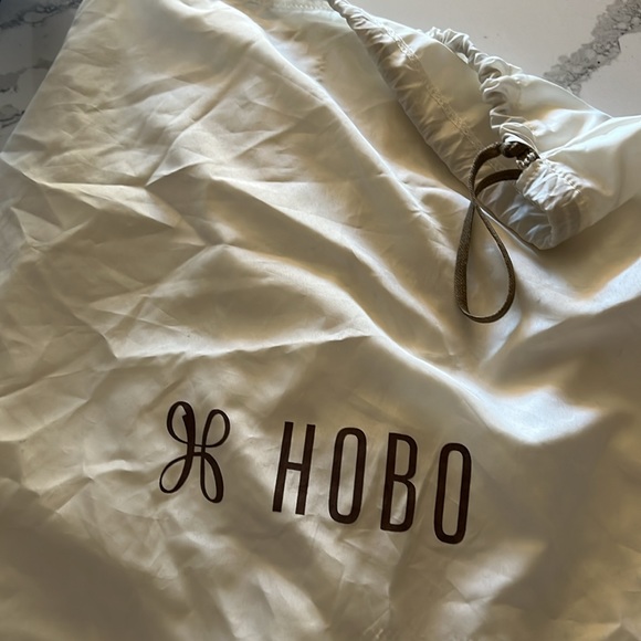 HOBO BRAND RIVER EMBOSSED FLOWER DESIGN IN BLACK ON TAUPE LEATHER EUC - Picture 14 of 14